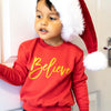 Red & Gold Believe Sweater