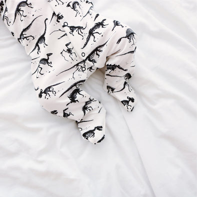 Milk Dino cotton sleepsuit